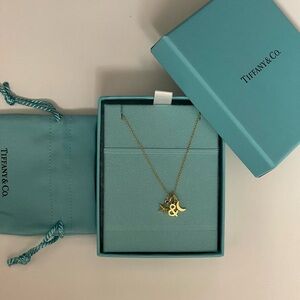 Tiffany & Co love star and moon pendant necklace 18k yellow gold